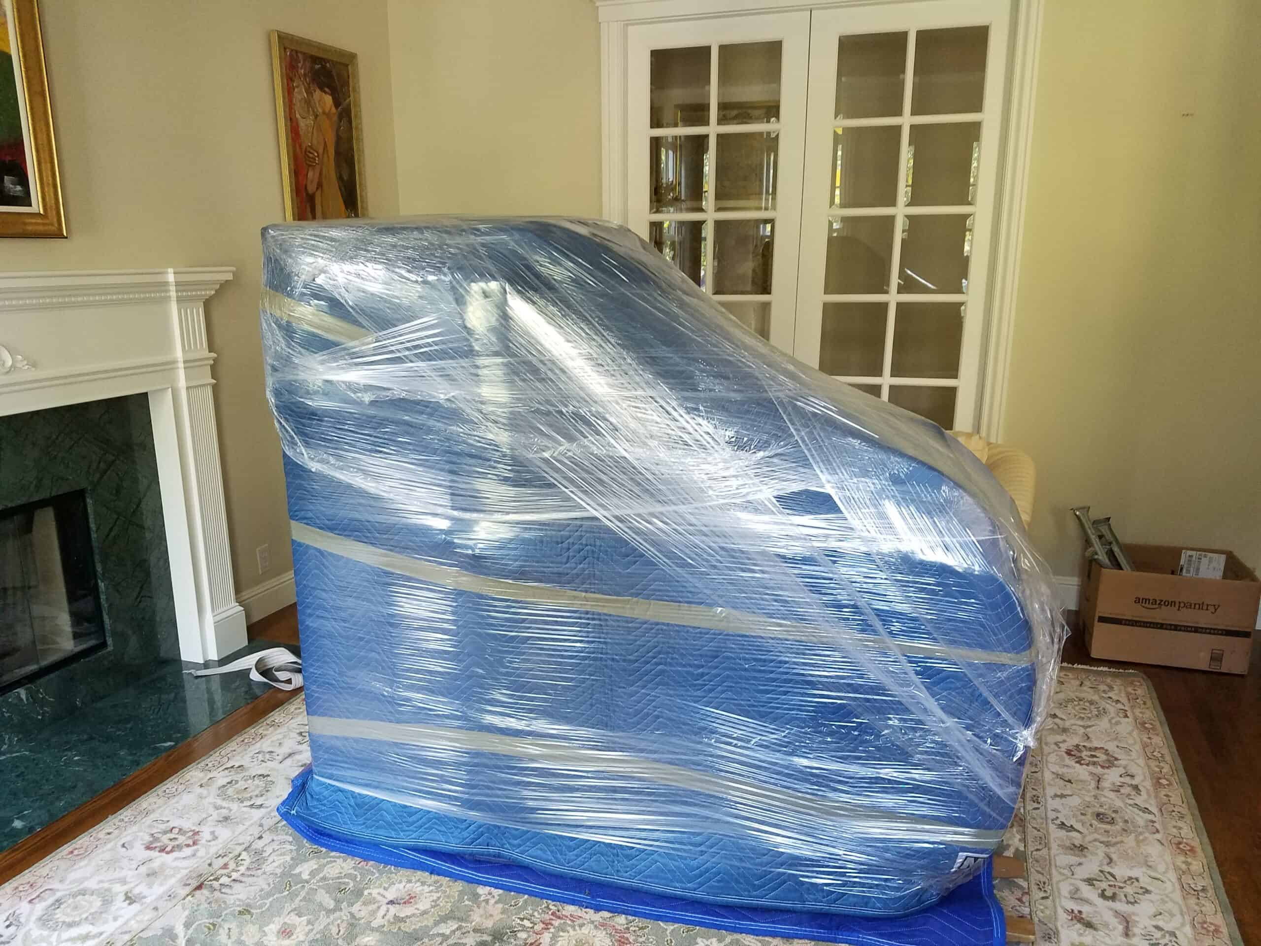 Piano being loaded for transport
